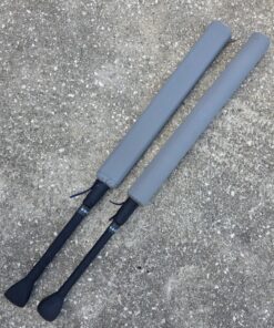 40" Foam Fighting weapons for larp sports with black handles and grey Ripstop covers laying on the concrete for comparison between the flat down stick and the Omni stupid long bat versions.