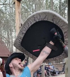 Foam Fighter Thunderbird triumphantly holding his custom made wing shield.