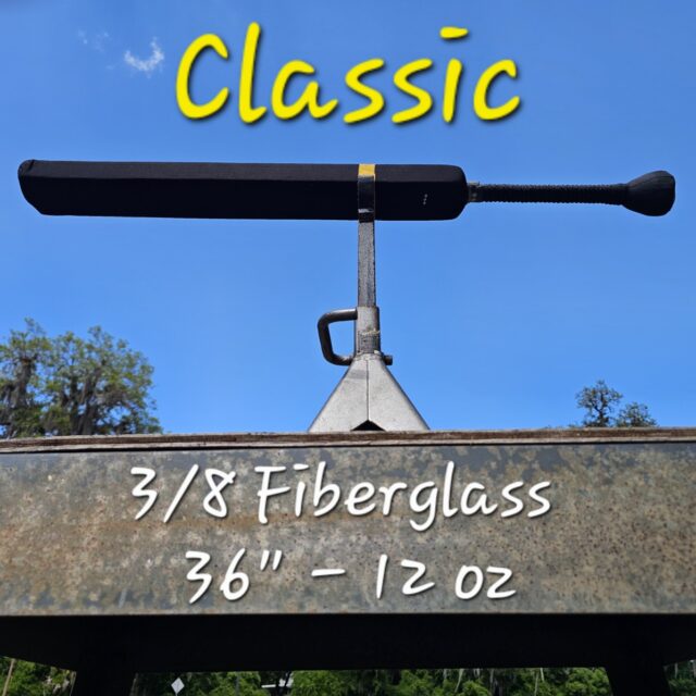 Classic Fiberglass Sword balancing on a jack stand