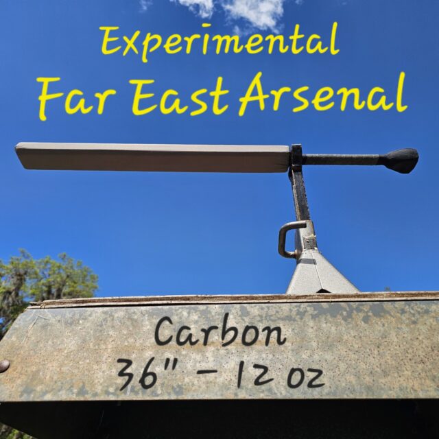 Experimental Far East Arsenal Blue Sword balancing on a jack stand