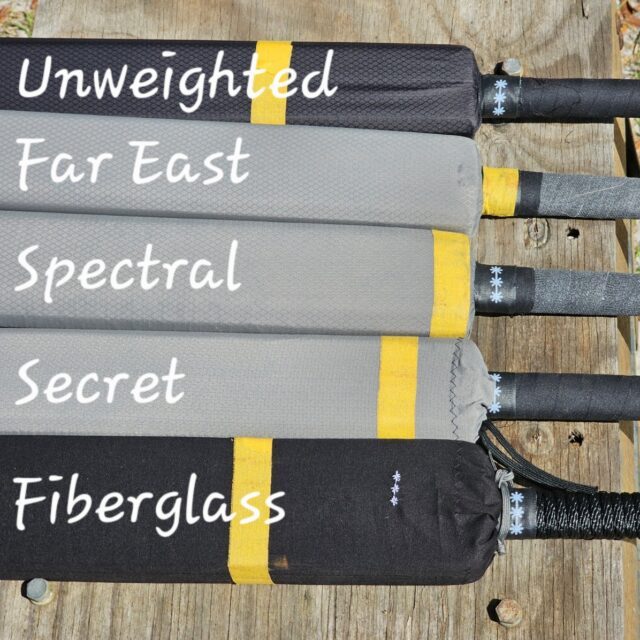 Five Foam Sword laying on a table marked with yellow tape at their balance points with white text labeling their sword names