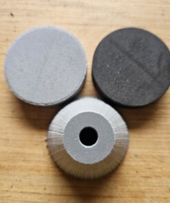 Pommel Kits (3/8" ID) 6lb gumdrop, 4lb disc, and 2lb disc placed individually on a wooden table